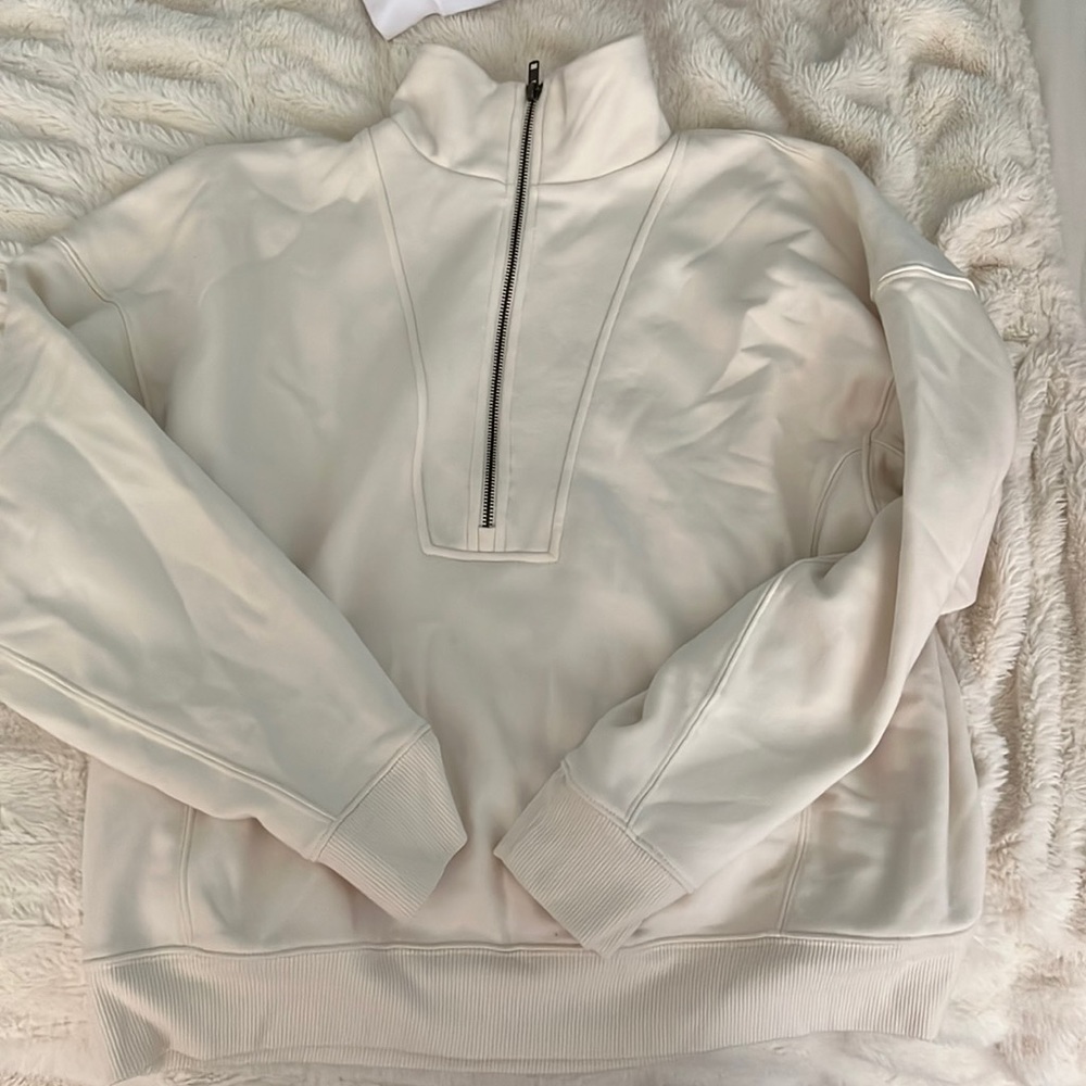 cream quarter zip with high neck